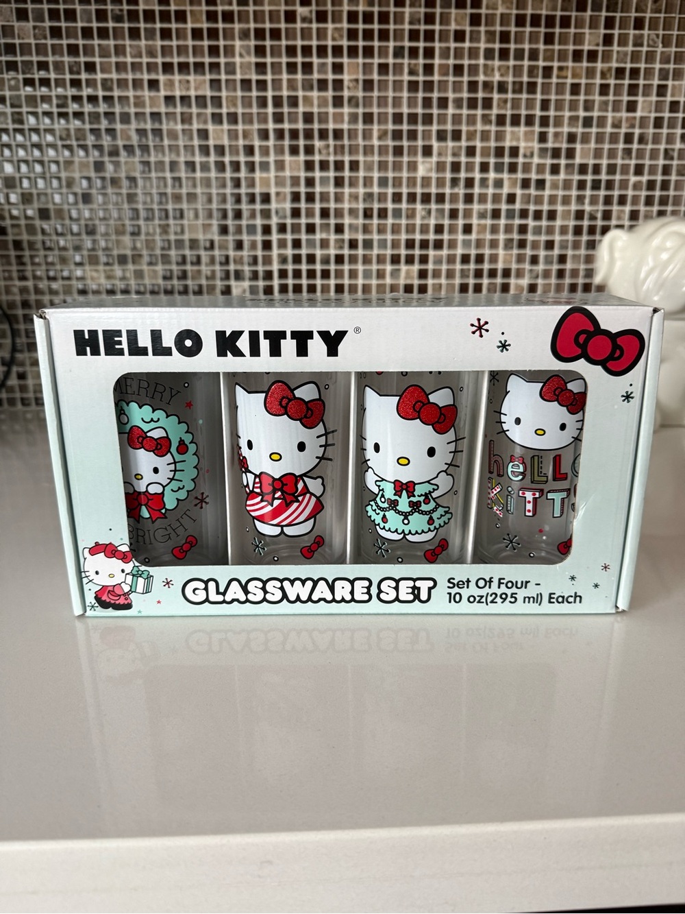 Hello Kitty Christmas glassware set with Hello Kitty graphic featuring a red bow